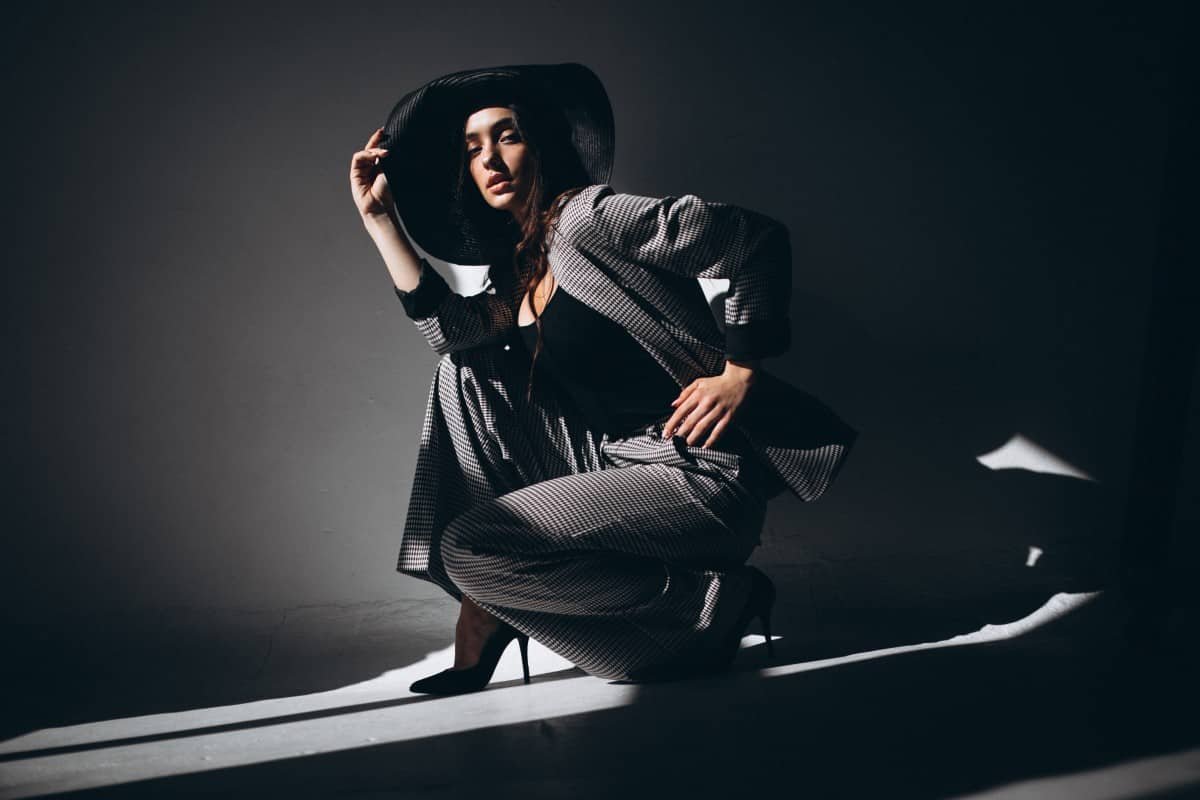 Home woman model business suit wearing hat 1.jpg